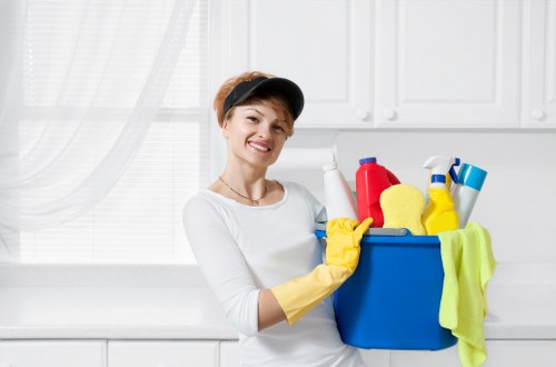 End of tenancy cleaner preparing a Hammersmith kitchen for handover