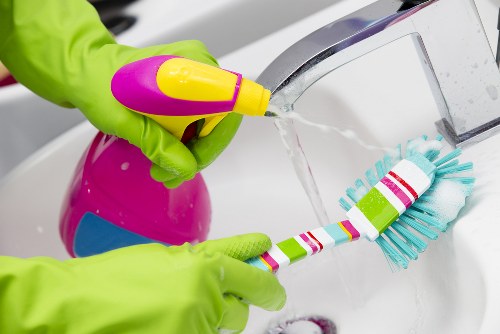 Cleaning team working in a Hammersmith flat with local access considerations