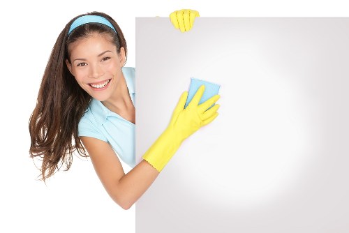 Professional cleaner Hammersmith following safety procedures