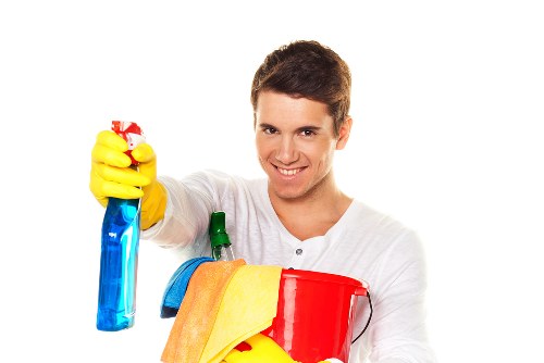 Local window cleaner working on residential flats in Hammersmith